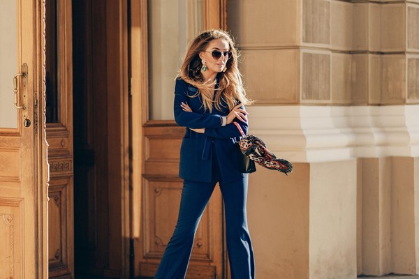 beautiful-smiling-woman-dressed-elegant-suit-sunglasses-walking-street-smiling-sunny-weather