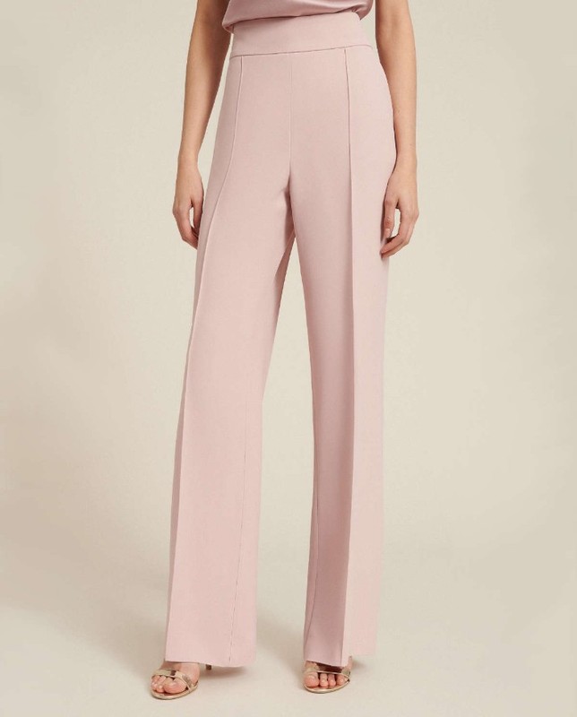 Spodnie na wesele z kantami w kolorze pudrowego różu