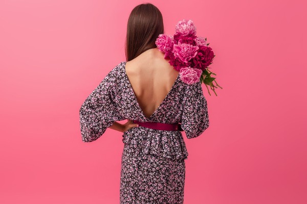 stylish-woman-pink-summer-trendy-dress-posing-with-peony-flowers-bouquet-view-from-back