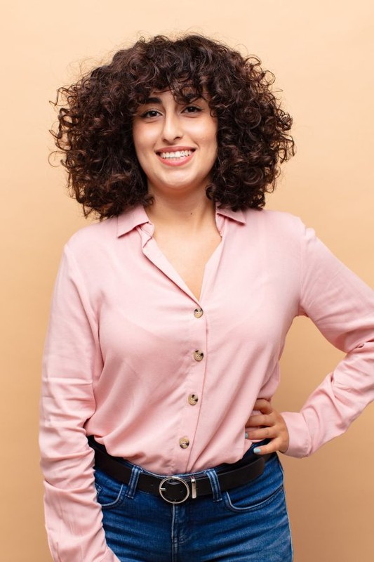 young-pretty-woman-against-isolated-background-min