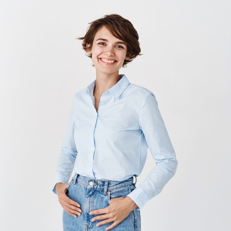 young-working-woman-office-clothing-smiling-looking-camera-standing-white-background-professional-women-concept